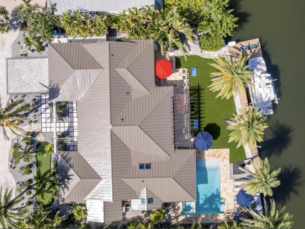 Anna Maria Island Vacation Rental - Luxury Canal Front Home with Pool & Dock